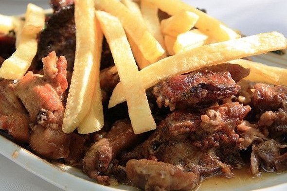 Foto de la receta de conejo al ajillo con patatas Receta de conejo al ajillo con patatas