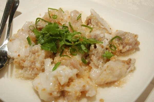 Foto de la receta de pescado empapelado al ajillo Receta de pescado empapelado al ajillo
