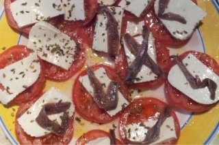 Receta de aperitivos de tomate con anchoa