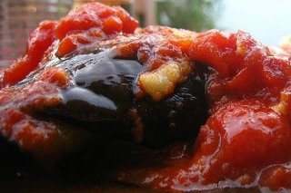 Receta de berenjenas con tomate y queso