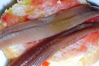Receta de canapés de anchoa con tomate