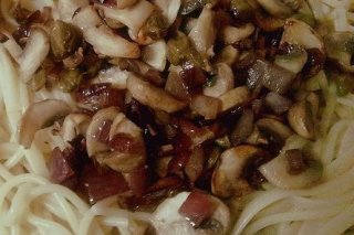 Receta de espaguetis con champiñones encebollados