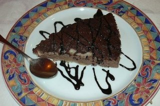 Receta de tarta de chocolate con queso y coco